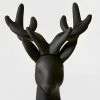 Cheap 😍 12" Plastic Sitting Deer Decorative Figurine Black - Wondershop™ 🔔