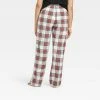 Best deal 🎁 Women's Holiday Tartan Plaid Fleece Matching Family Pajama Pants - Wondershop™ Cream ✨